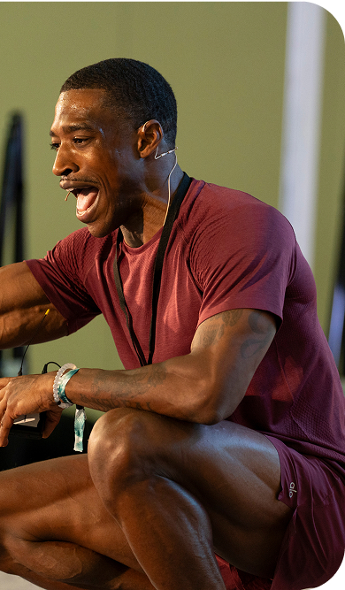 Jacy Cunningham teaching a workout class at Eudēmonia Summit